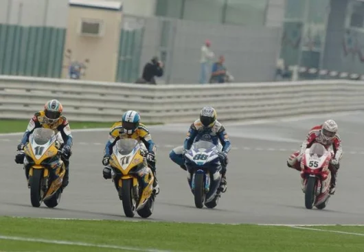Corser, Kagayama, Pitt and Laconi in the early stages of Race One, take two!
