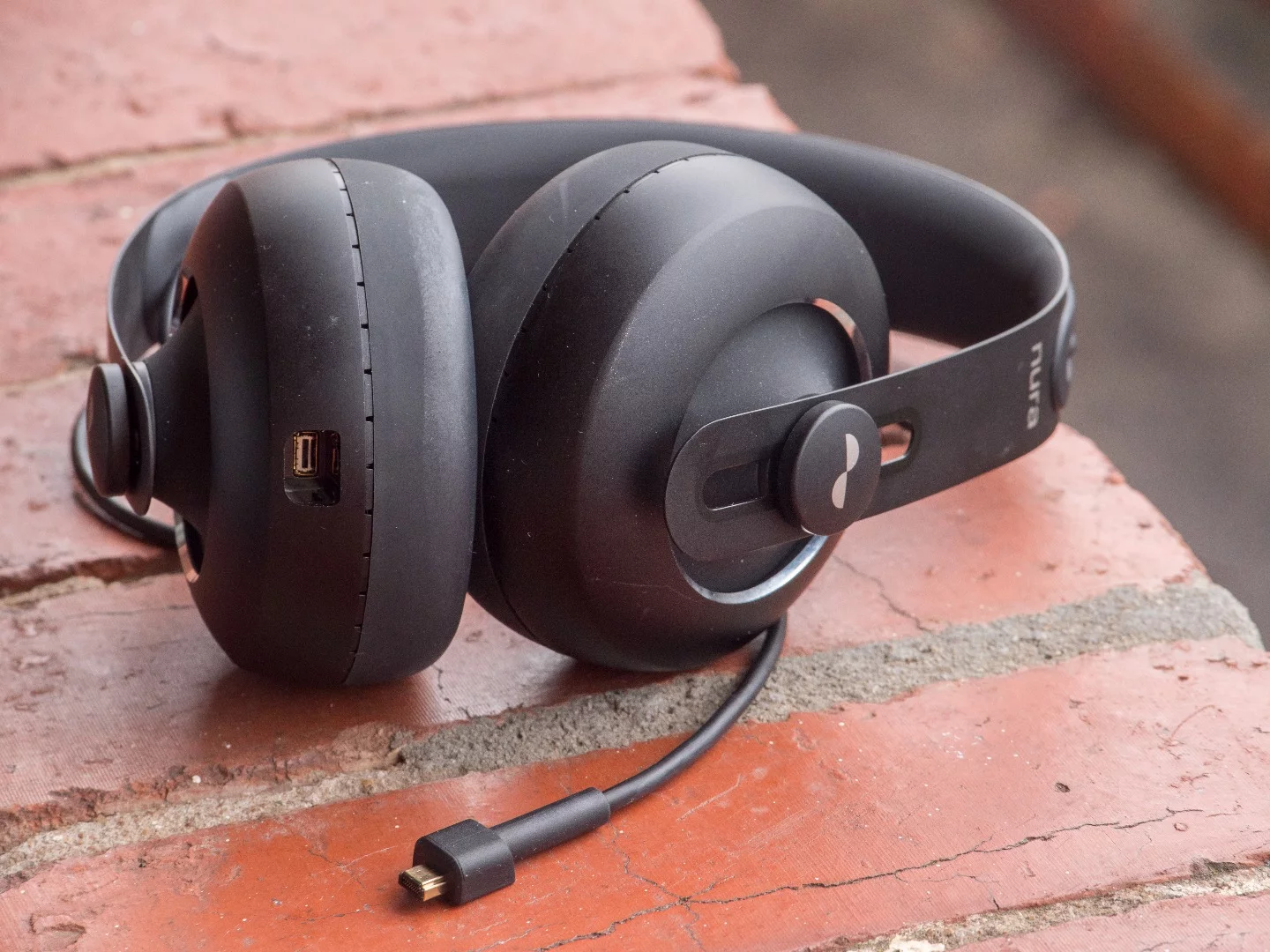 Nuraphones: proprietary cable design was an unfortunate necessity; this connector needs to be able to handle Lightning, USB, USB-C, Micro USB and 3.5mm analogue signals