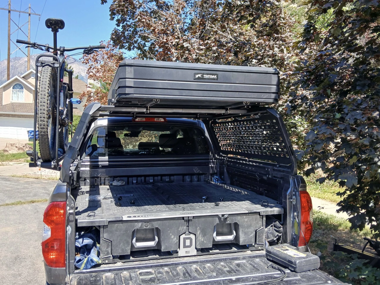 We offset the Vision XL to the right so that we can open the tent with the bike still mounted. We're also hoping to get an awning between the bike and tent but not sure it'll fit properly