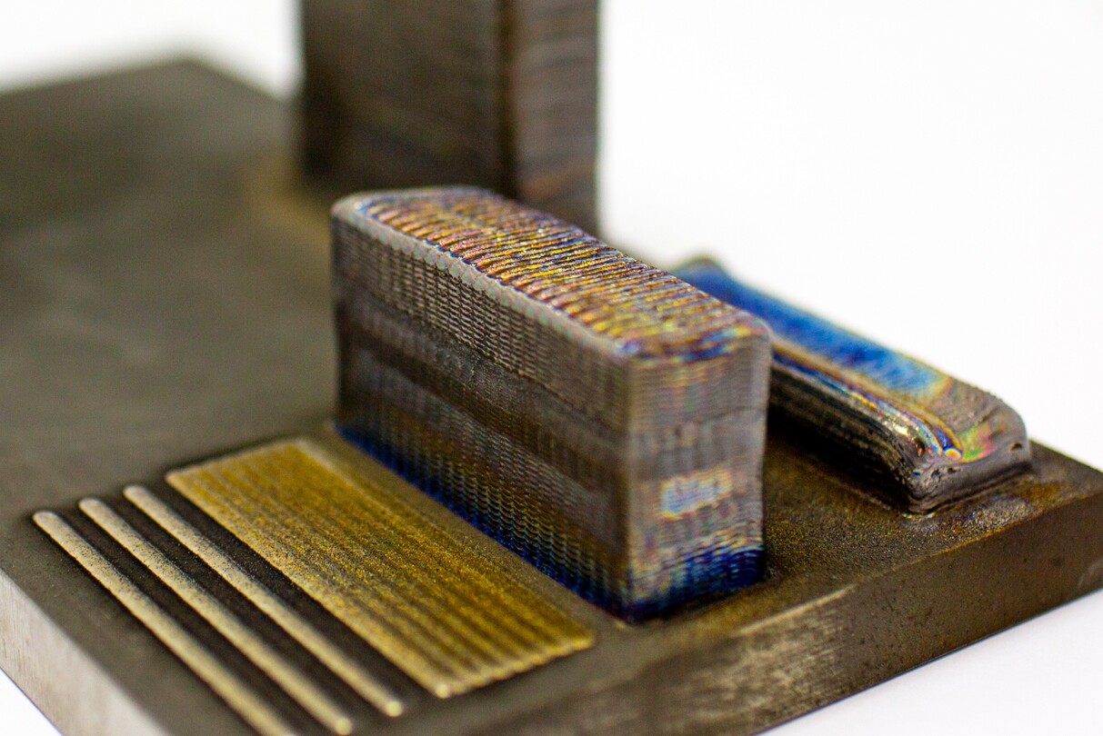 A 3D-printed titanium-copper block, made at RMIT