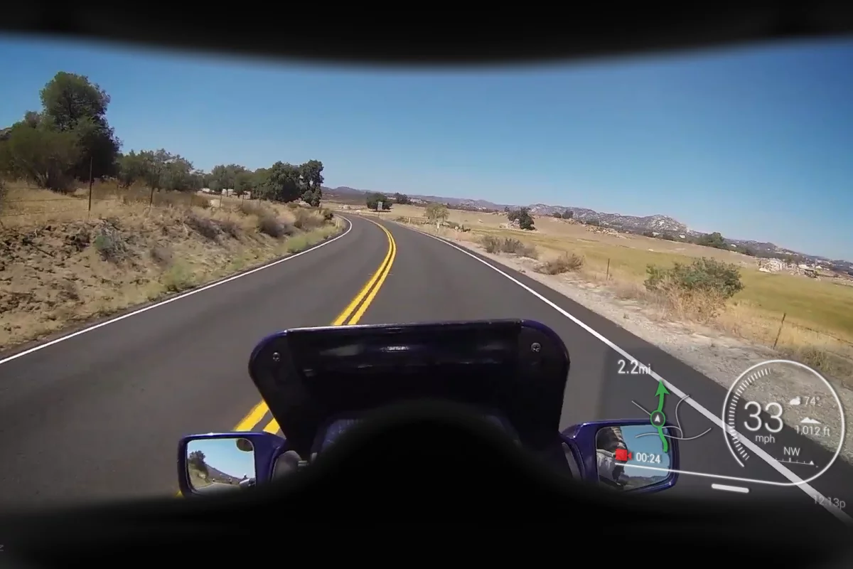 The Ride:HUD display (lower right) as seen through a motorcycle helmet