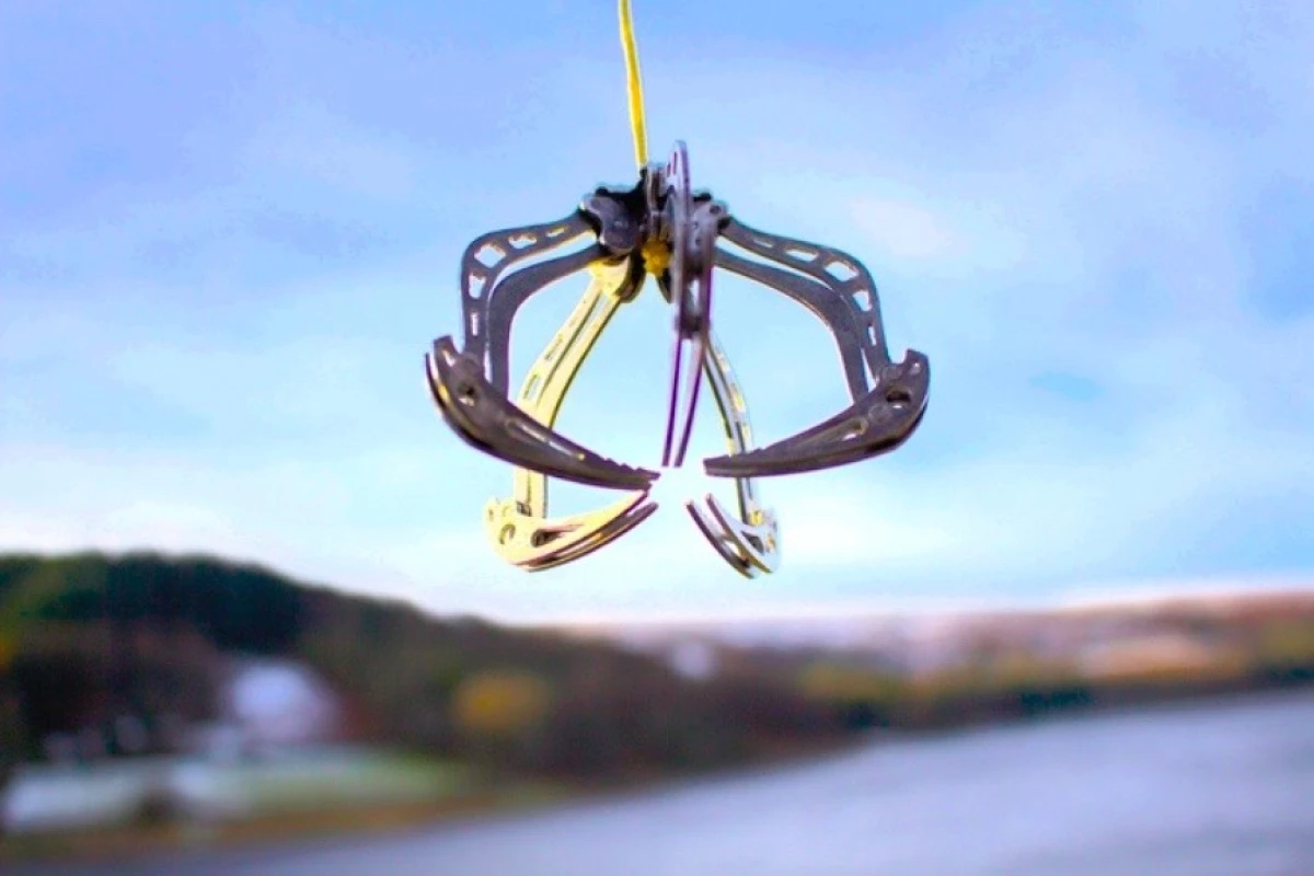 The Mantis Drone Claw's hinged design allows it to grasp objects that it's lowered onto