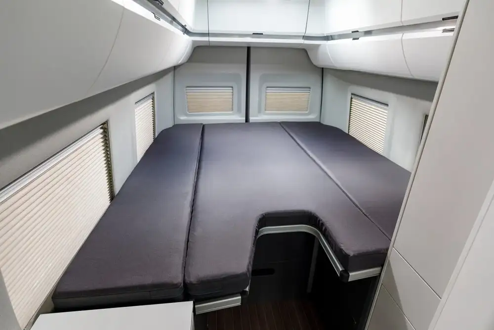 The Grand California 680 offers a longitudinal bed, the main advantage being no one has to climb over the other to get to the bathroom or front of the van
