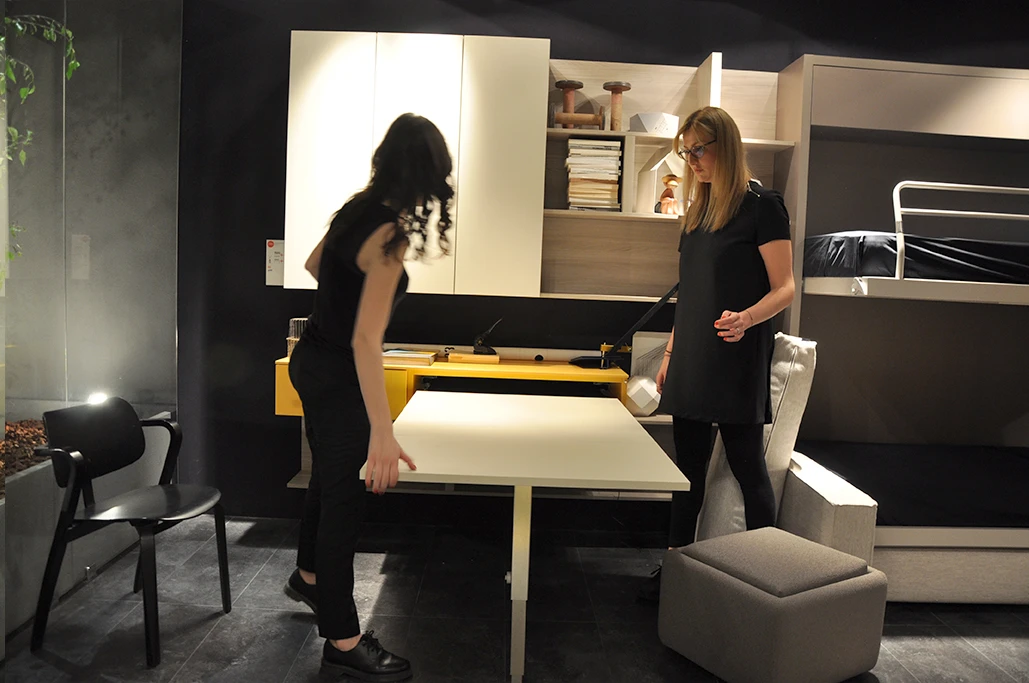The hidden dining table can also double as a single work desk
