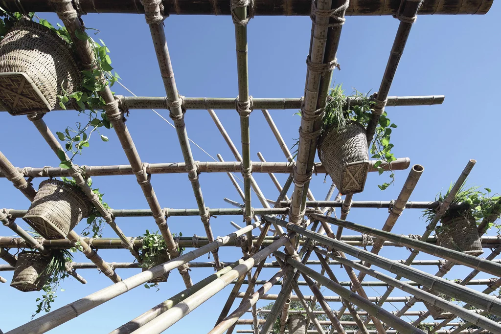 Penda added buckets of seeds that will eventually grow to cover the pavilion in greenery
