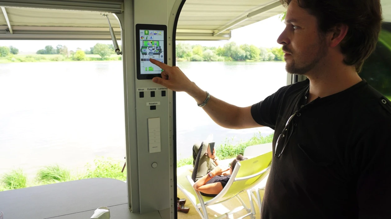A touchscreen system provides advanced monitoring and control for the various systems around the caravan