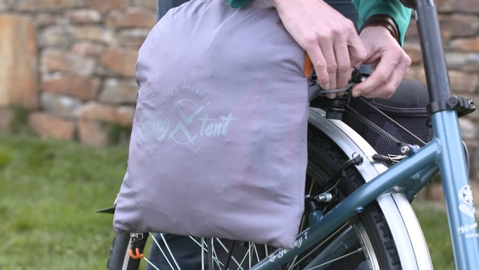 Strapping the Flying Tent to a bike