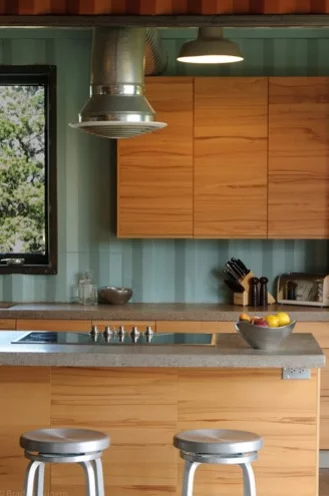 The Shipping Container House's kitchen appears to be situated within one of the containers