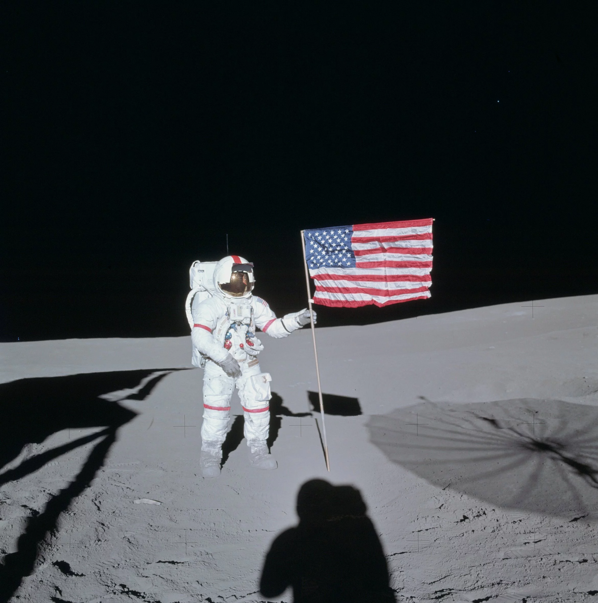 Shepard plating the US flag on the Moon