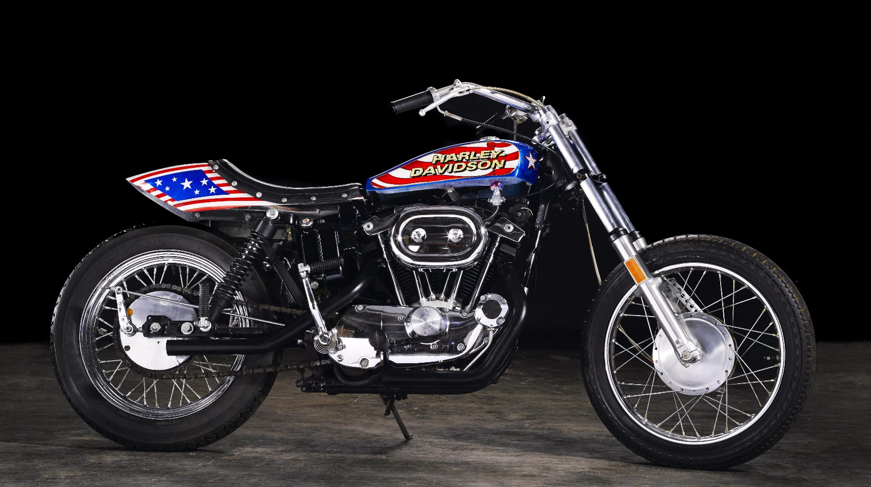 This 1976 Harley-Davidson XL1000 custom was used in the film 'Viva Knievel!' by Evel Knievel and built by Bud Ekins. It is estimated to sell for $80,000 to $100,000