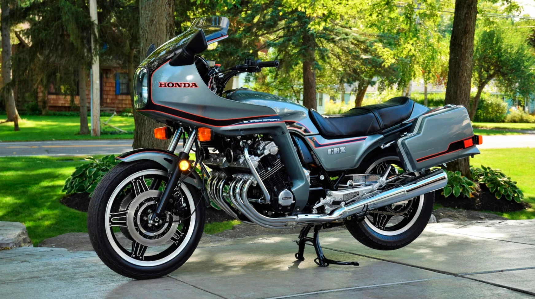 The Honda CBX was the first motorcycle to broach the 100 horsepower mark as Honda's flagship supersport motorcycle in 1978, then it was significantly refined as a sports tourer with turbine smooth propulsion and a 140-mph top speed. Much bigger forks, Pro-Link monoshock rear suspension, factory-engineered wind protection, color-keyed detachable saddlebags, dual front ventilated stainless steel rotors were a production motorcycle first, with two-piston calipers for fade-free braking. This bike held the CBX auction record prior to the 2021 Las Vegas auctions, having sold for US$26,950 at Las Vegas in 2020.