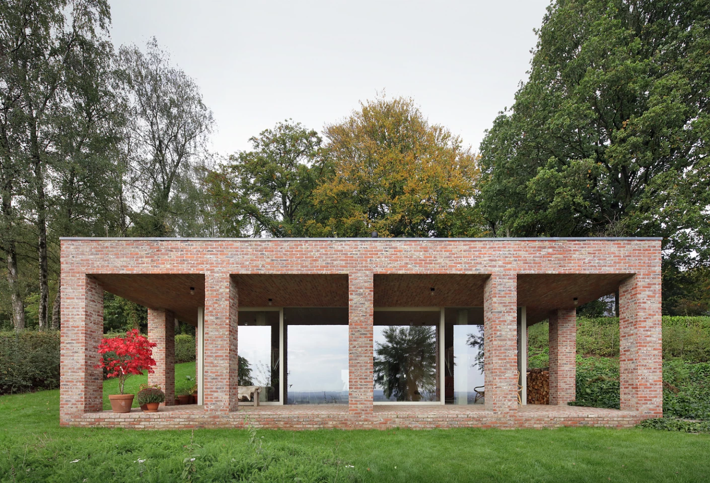 The three-bedroom family home is built into the sloping hillside