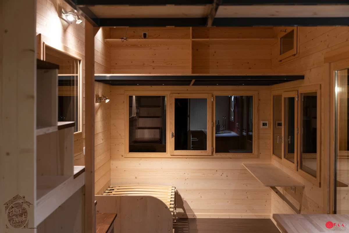 Visitors enter the Axelle into a living room with custom-made sofa bed (pictured without the cushions)