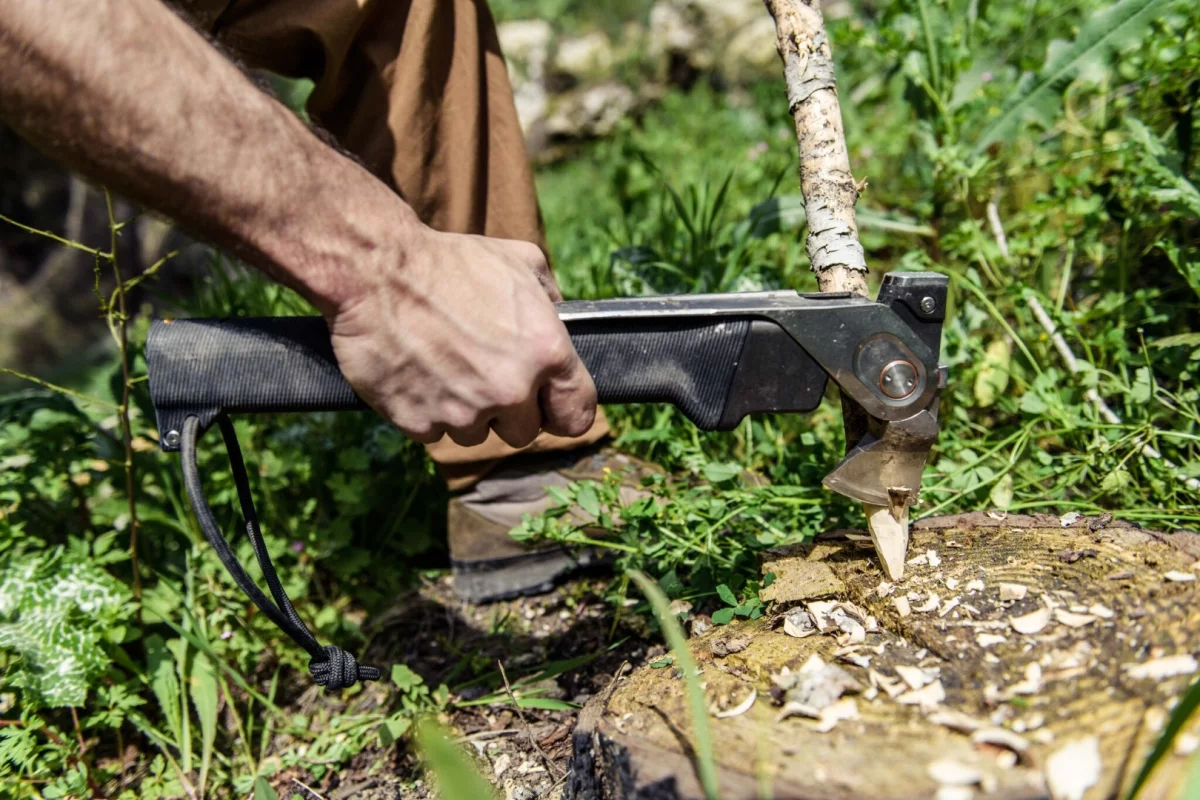 One of three primary tools on both the Combar and Combar pro is the flip-out hatchet