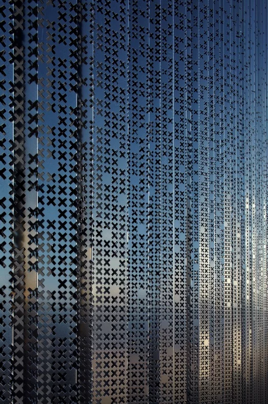 The steel cell structure has been covered with a series of impressive customized perforated aluminum sheets