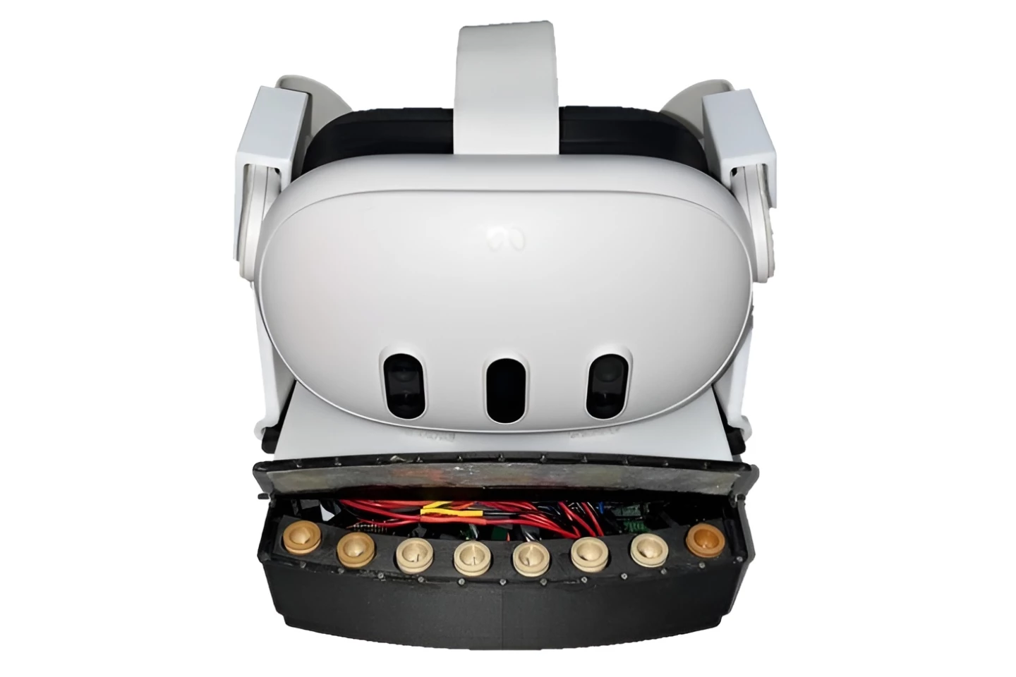 The Eight-Channel Wearable Olfactory Display for Virtual Reality (black box at bottom), connected to a commercial VR headset