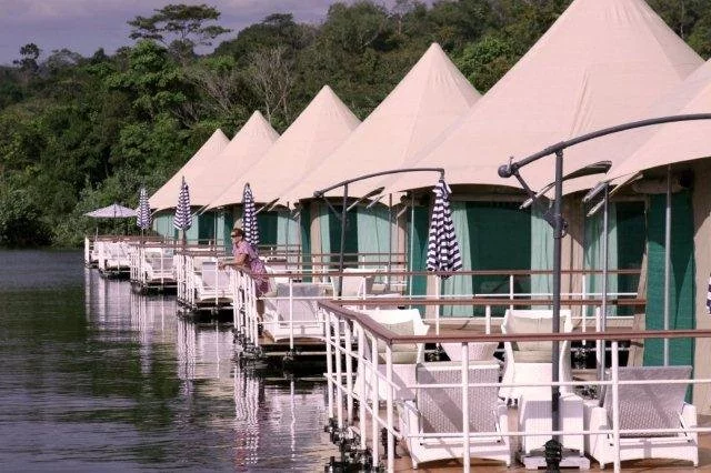 Each tent offers a deck that looks out onto the water, surrounding mountains and forests