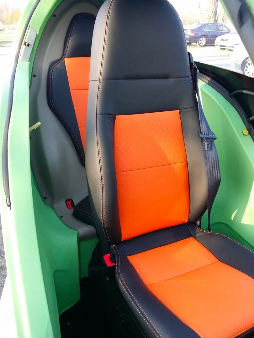 SAM seats a driver and one passenger