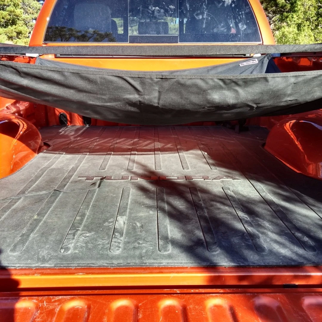 There is plenty of room underneath even when it's not pulled completely tight