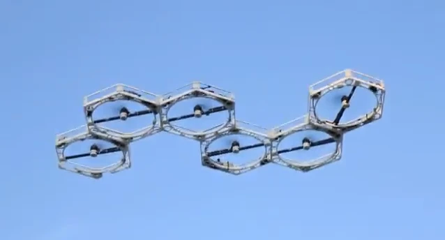 As the united band of robots hovers and climbs off the ground, each robot module is using inertial sensors to detect tilt and roll