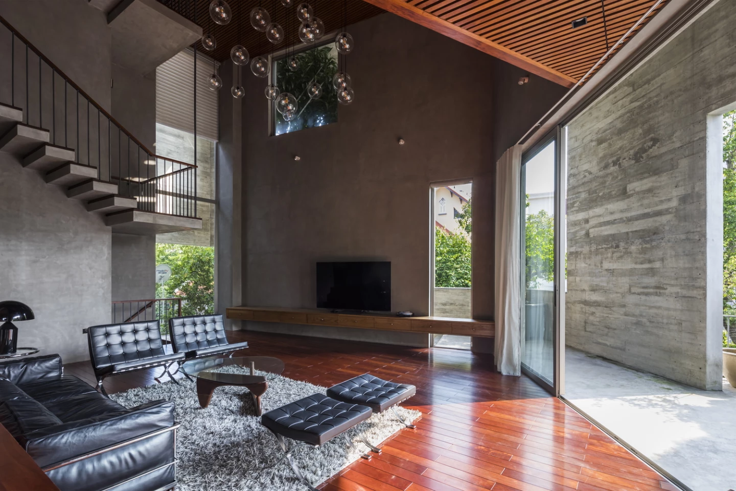 Ha Long Villa's shared areas, like the entertainment room pictured, are on the lower floors