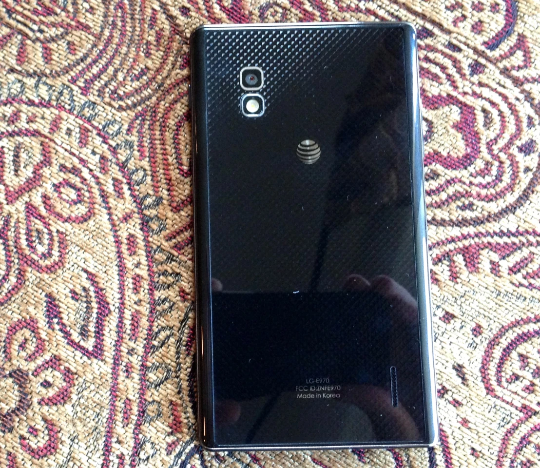 The glass back reflects a glittery, "Nexus One live wallpaper" look