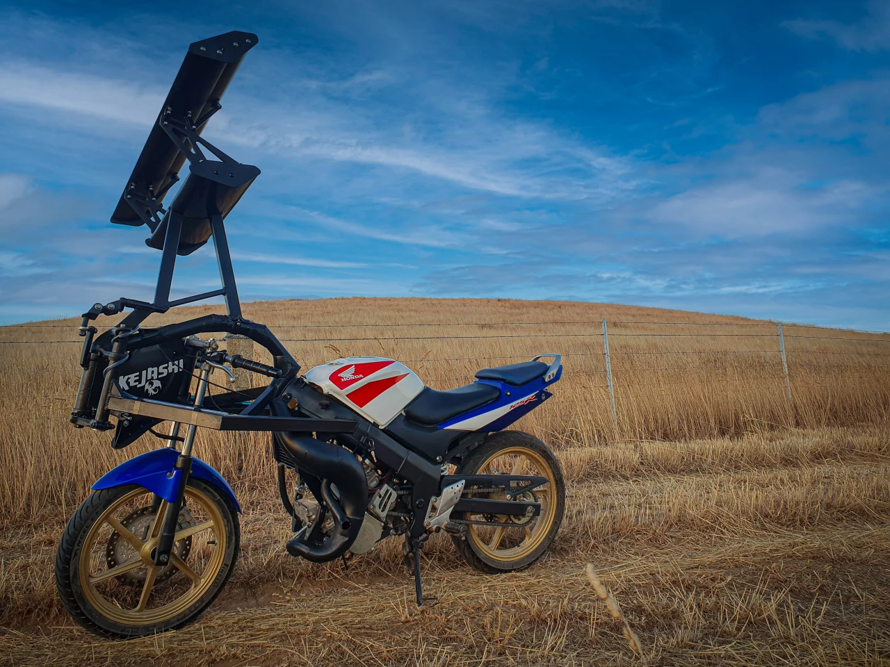 Yes, a tilt-wing motorcycle. And the wing might not be the oddest thing about this wild machine