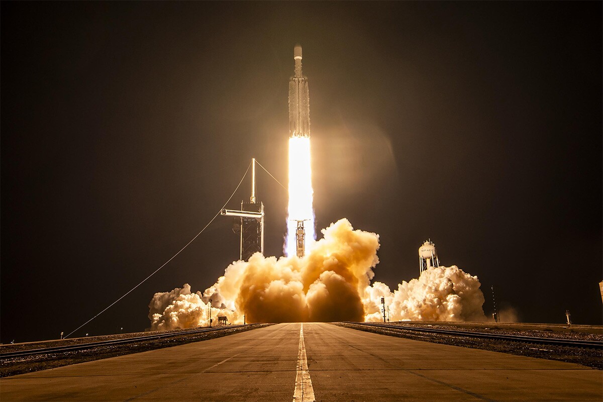 A SpaceX Falcon Heavy rocket launches with an X-37B on board from Kennedy Space Center in December 2023