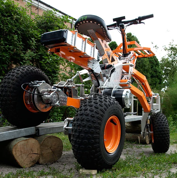 Demonstrating the mechanical titling mechanism on the EV4 off-road electric quad