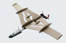 The hand-designed, laser-cut balsa plane uses PowerUp's 4.0 system to fly the model from your phone