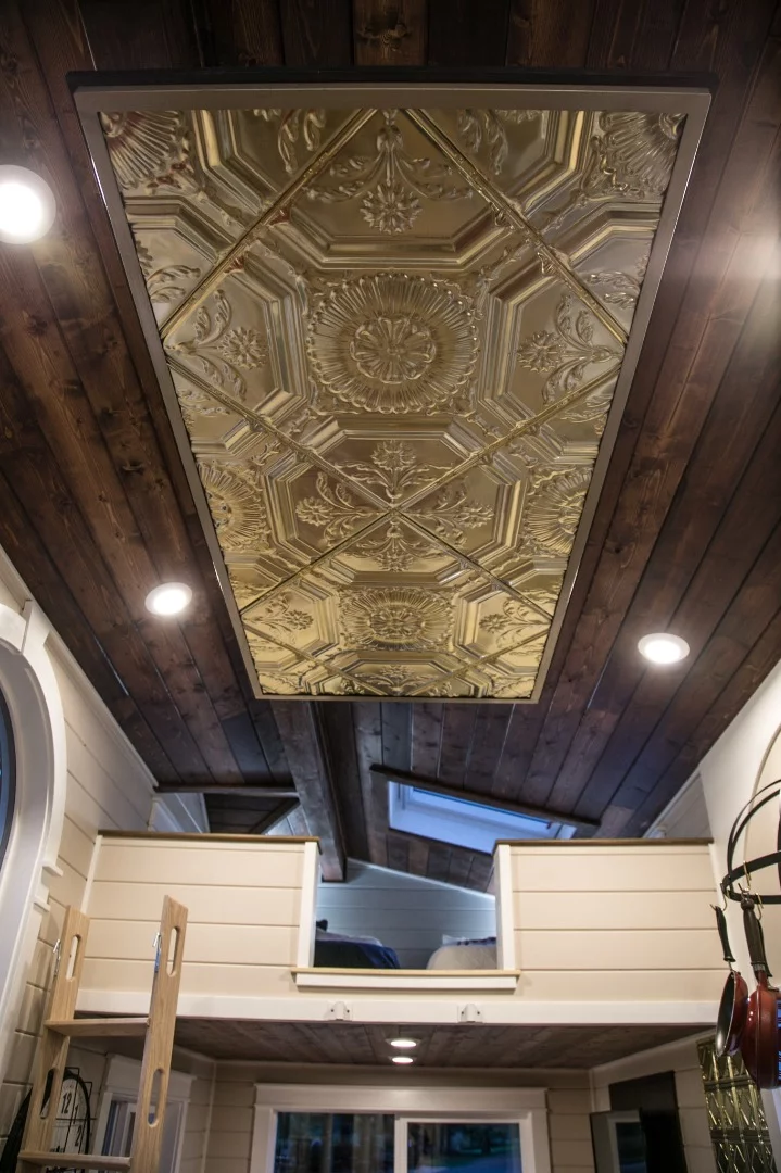 The Theater Home's decorative lighting feature hangs down from the ceiling