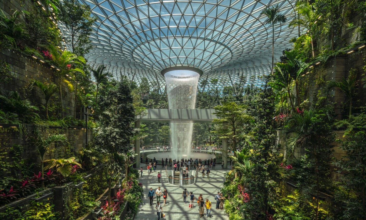 Singapore's Jewel Changi Airport, by Safdie Architects, is an airport that boasts the world's largest indoor waterfall