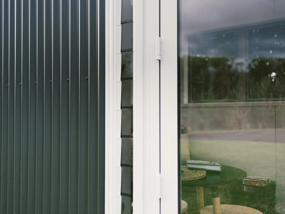 The Buster Tiny House is clad in corrugated metal