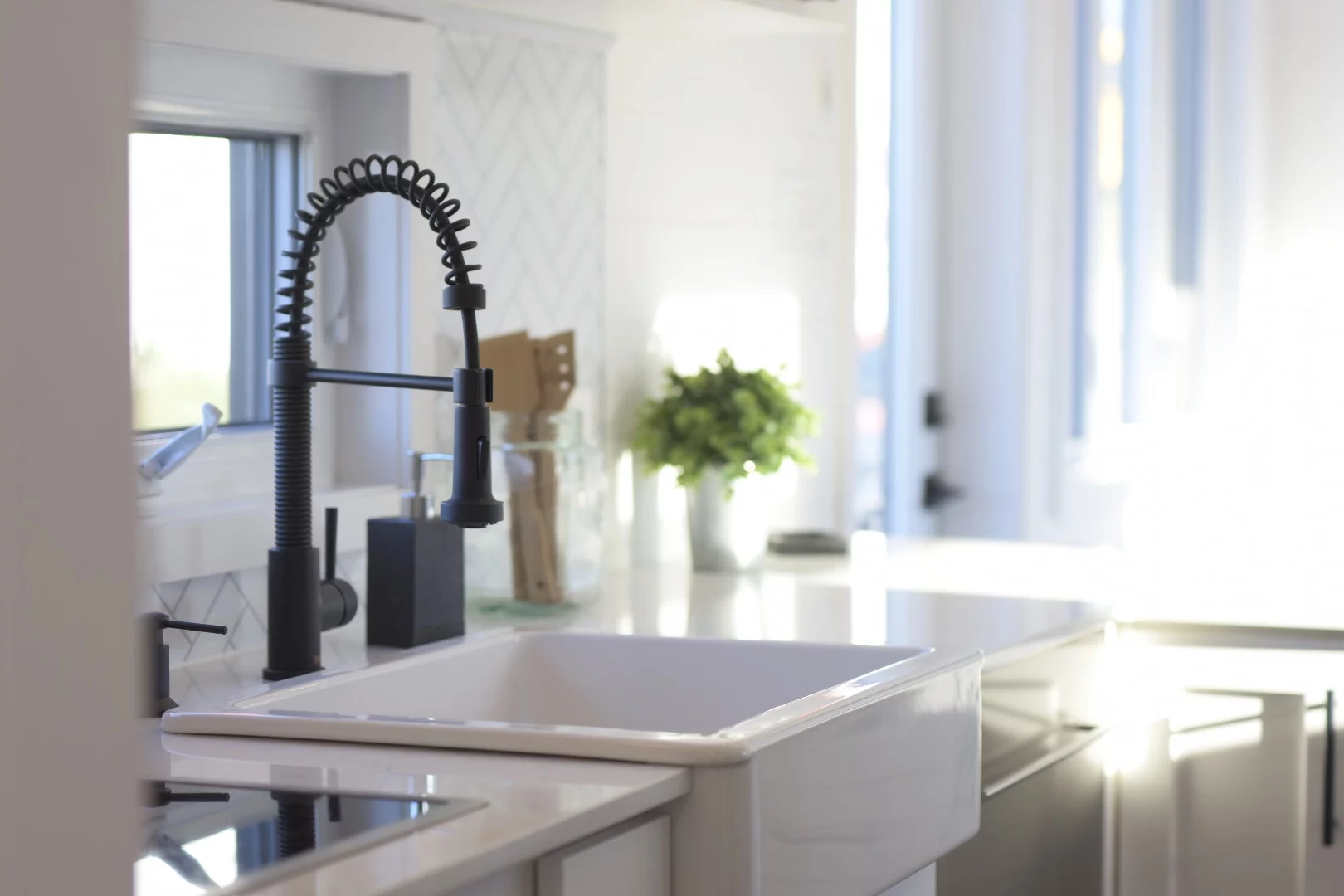 The Magnolia's kitchen includes a farmhouse-style sink