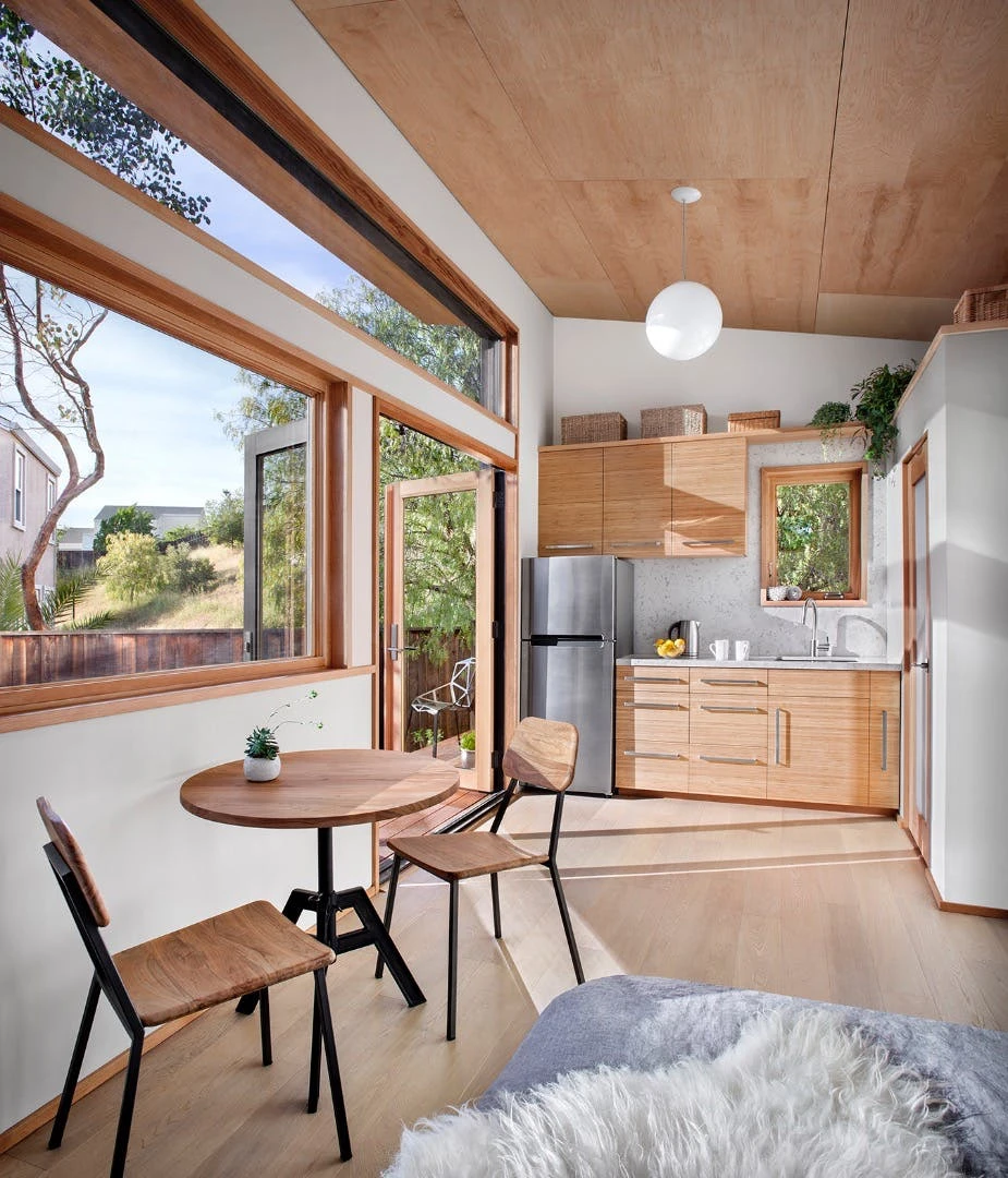 The interior of the Britespace flatpack home is finished in high-end materials including solid bamboo and maple cabinetry and oak flooring