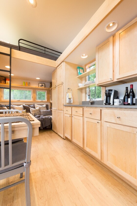 The kitchen boasts oak cabinetry