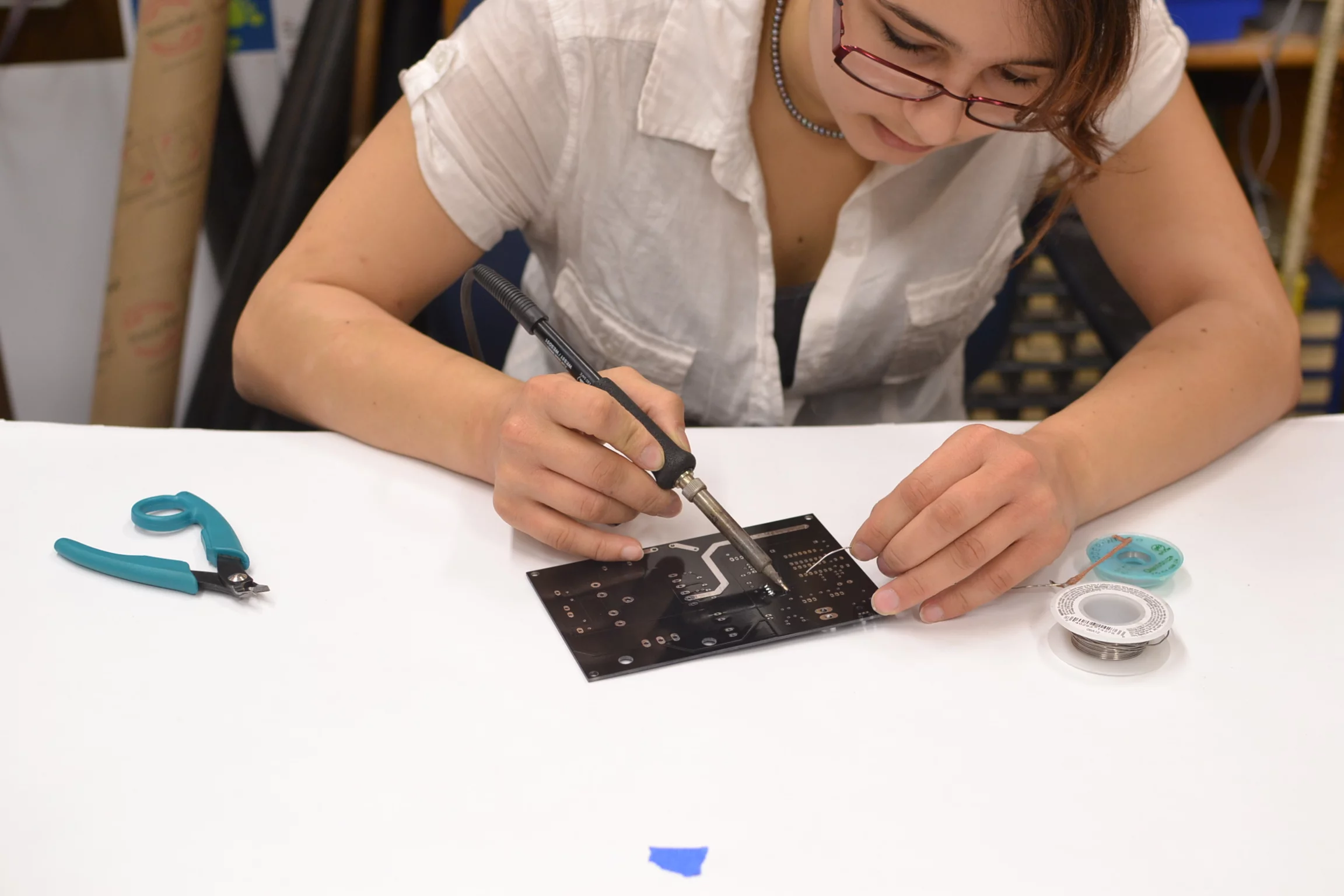 The oneTesla team's Heidi Baumgartner showing off her soldering skills