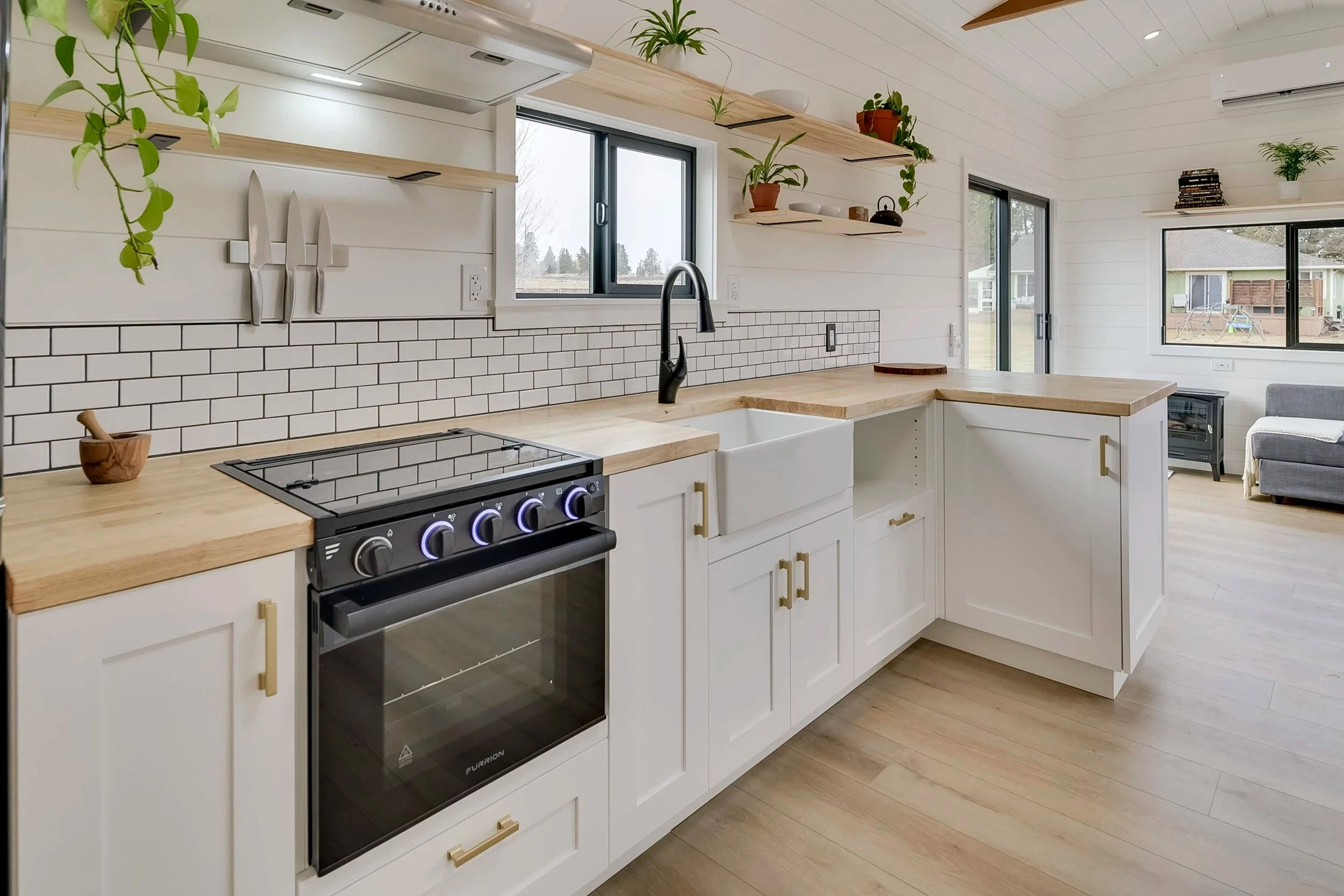 The Ochoco's kitchen includes lots of cabinetry and shelving