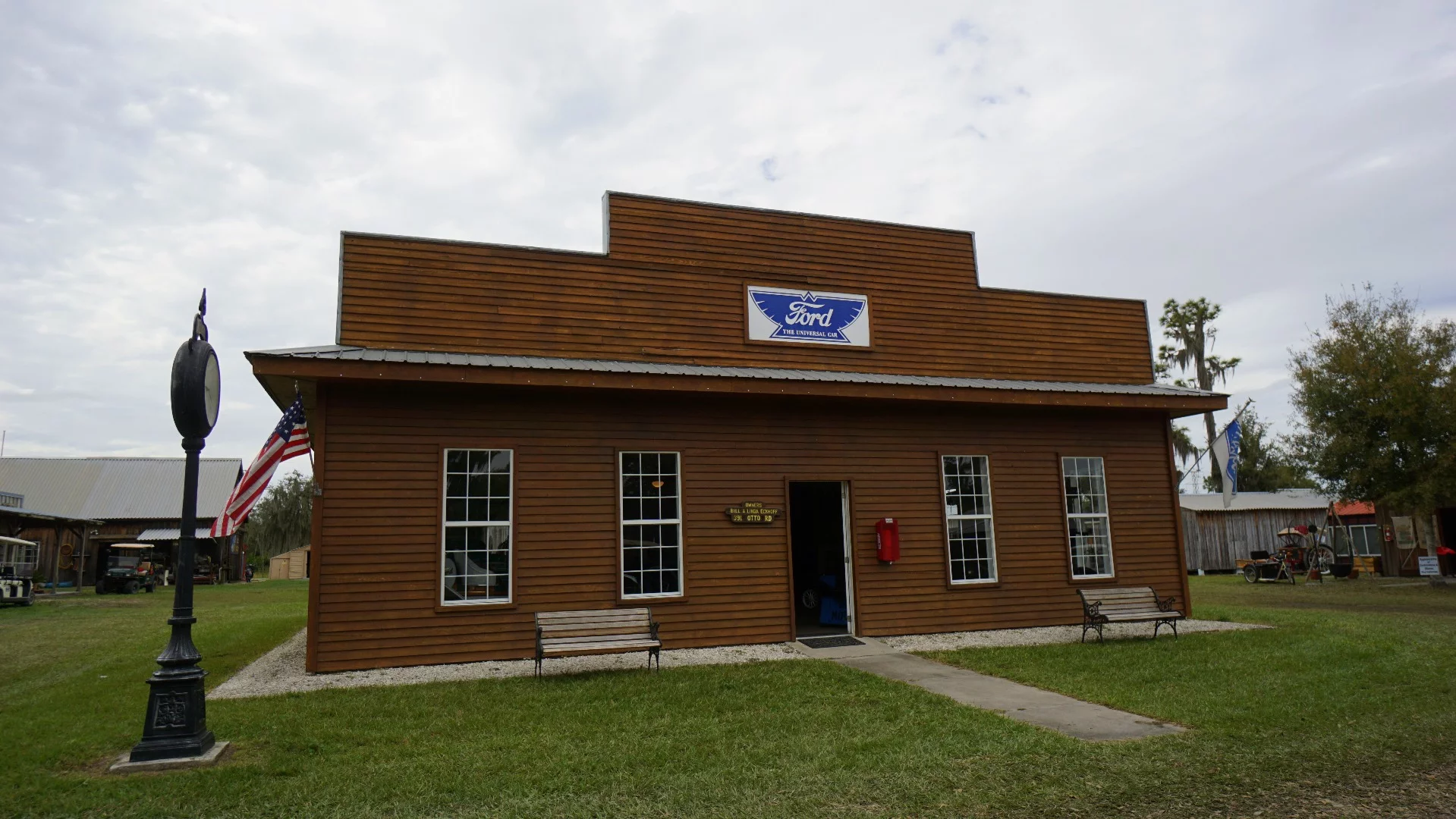 This vintage car dealership replica was made from wood from the sawmill