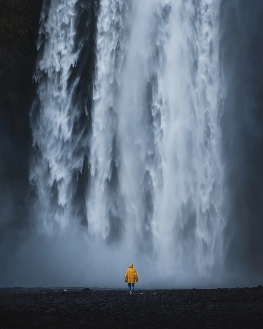 'Person in yellow at Skogafoss', Skogafoss, Iceland