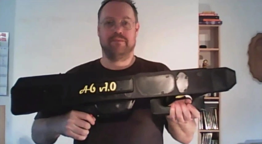 The one-of-a-kind Paper Airplane Machine Gun is made mostly from custom 3D-printed parts, along with various components bought in stores or over the internet