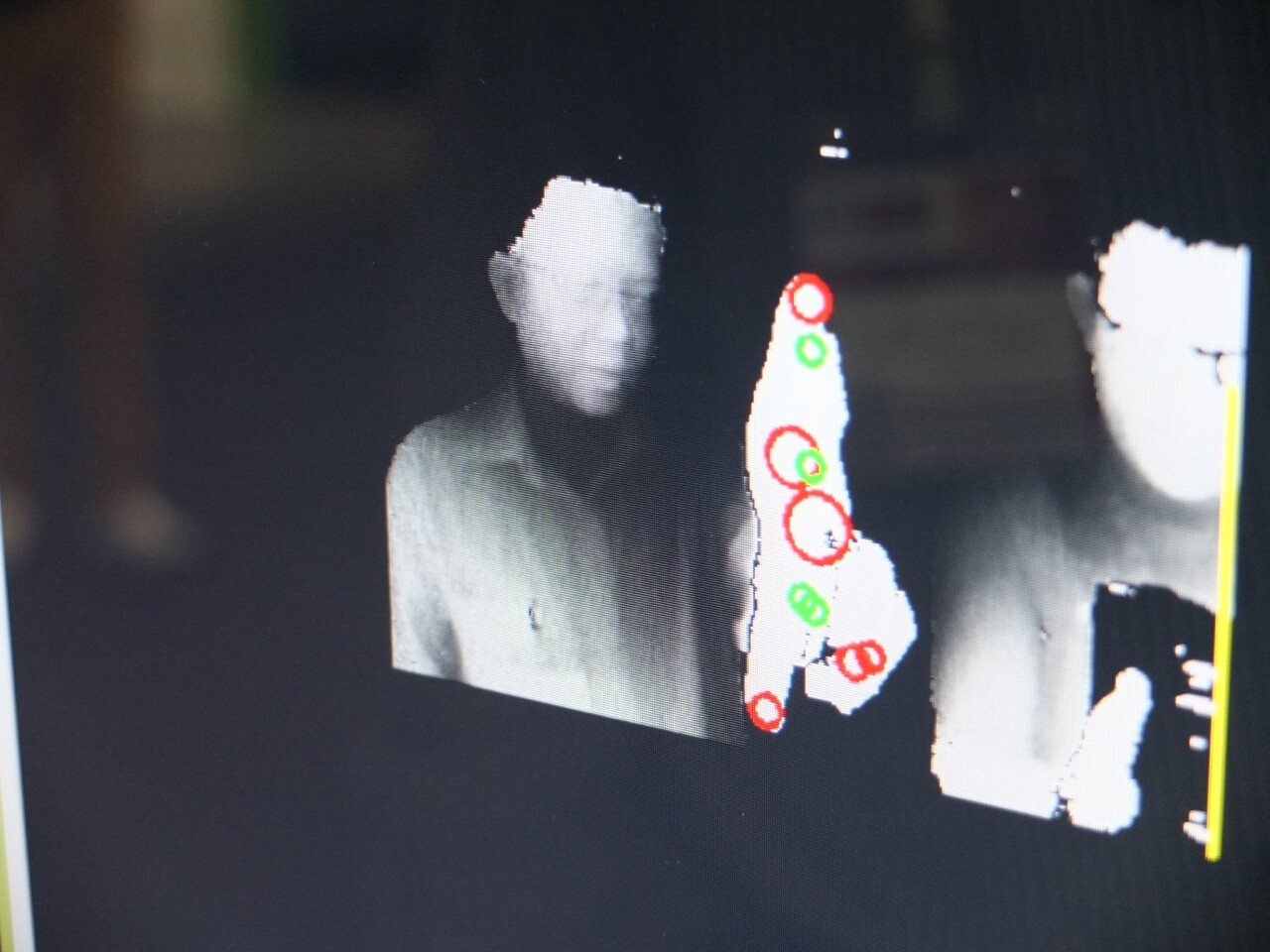 A company rep demonstrating the Creative Senz3D's features