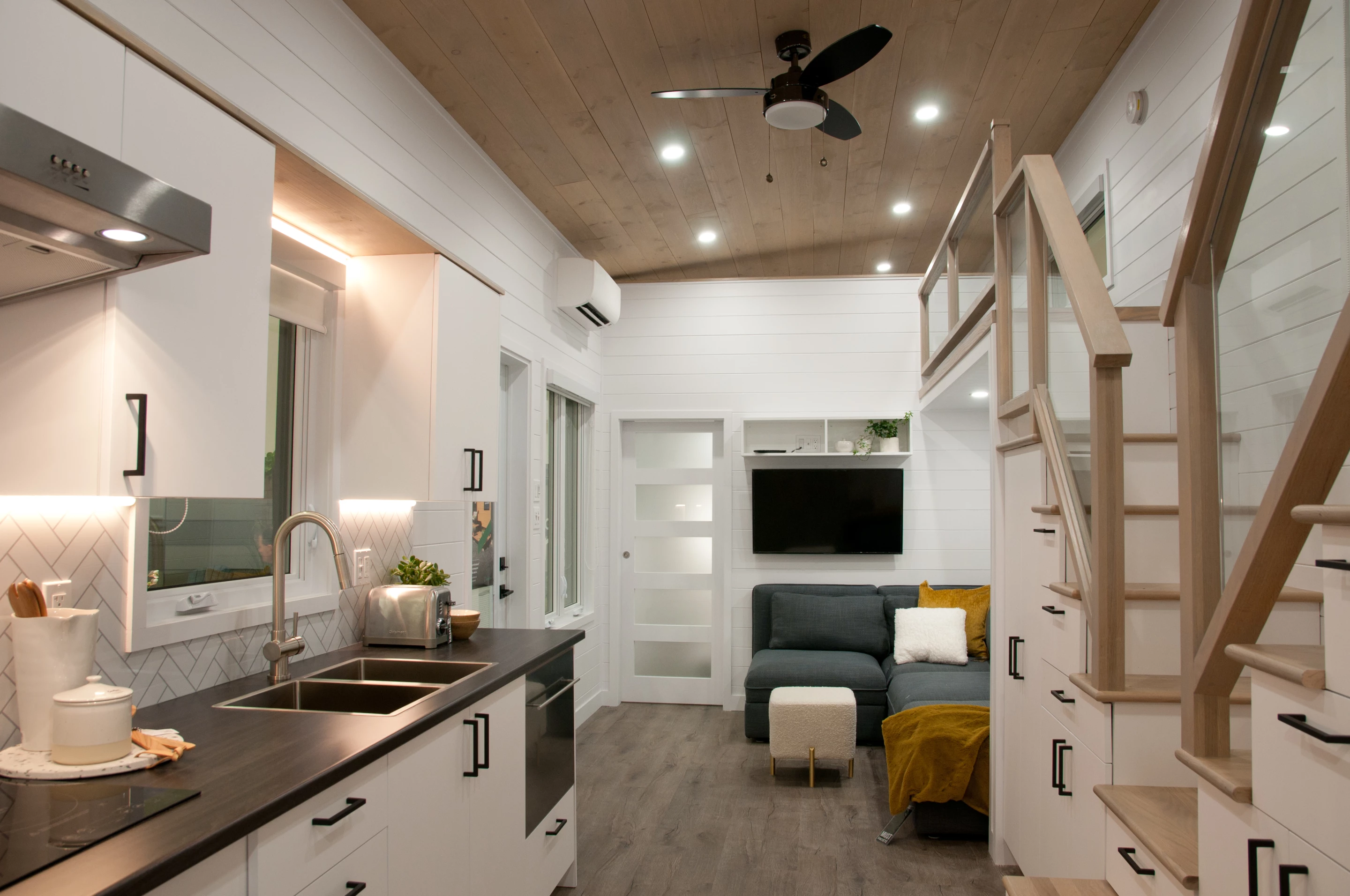 The Charme is kept a comfortable temperature with a mini-split air-conditioning unit, radiant underfloor heating, energy-efficient heat exchangers, and a ceiling fan