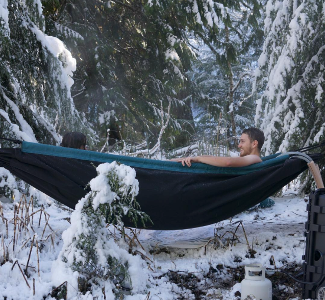 Enjoying the propane-heated hot water in the Hydro Hammock