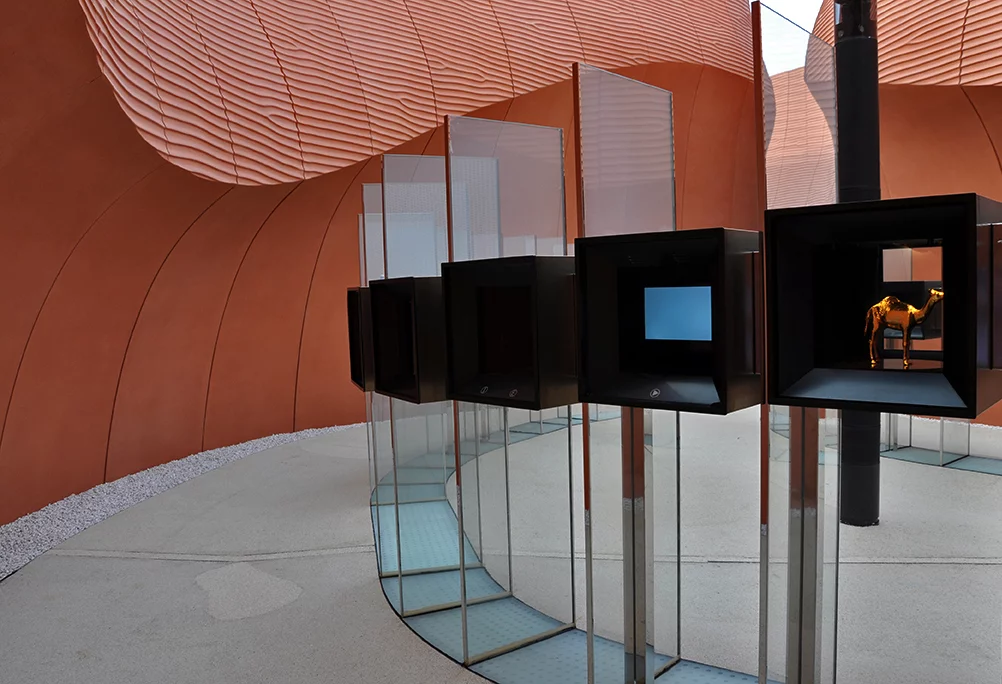 The pathways lead visitors up from the main entrance, through outdoor exhibit spaces