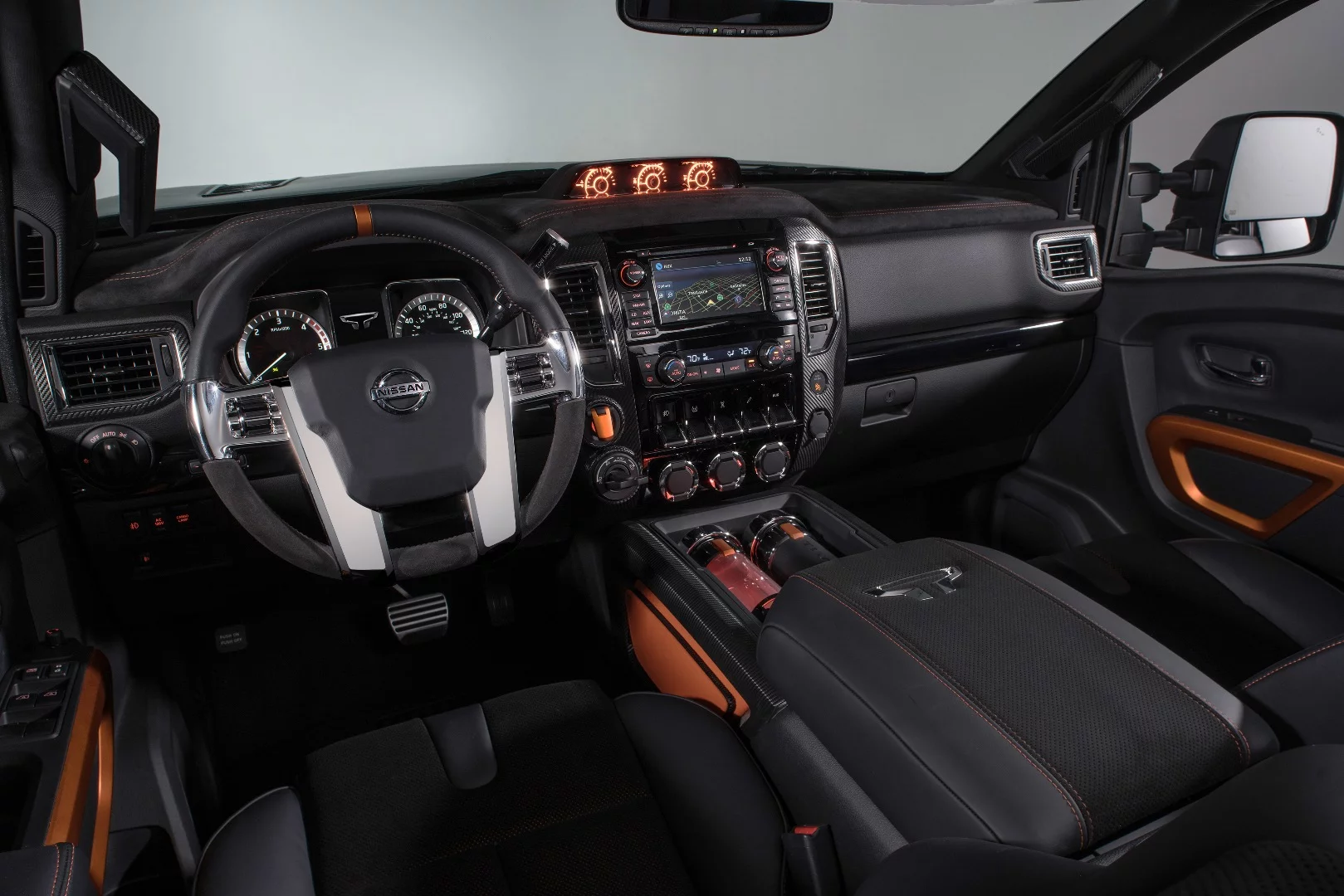 Inside, the Titan Warrior Concept includes a custom steering wheel, orange highlights and hot/cold drink holders