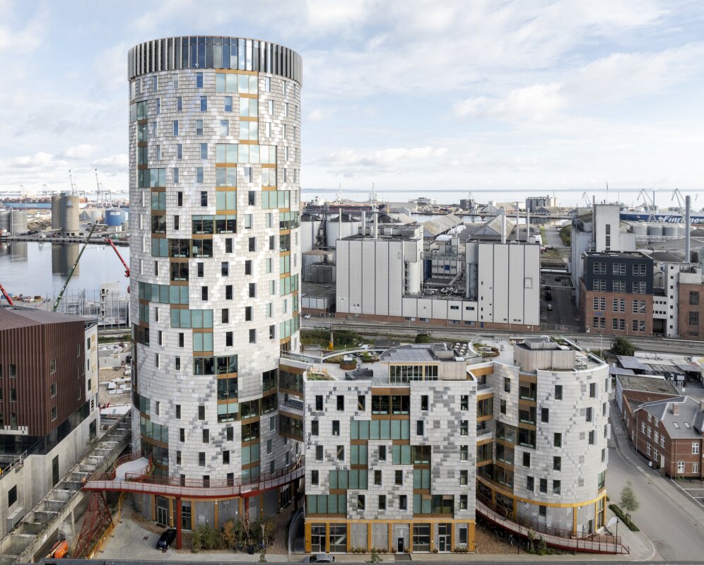 Record-breaking timber tower incorporates recycled wind turbine blades