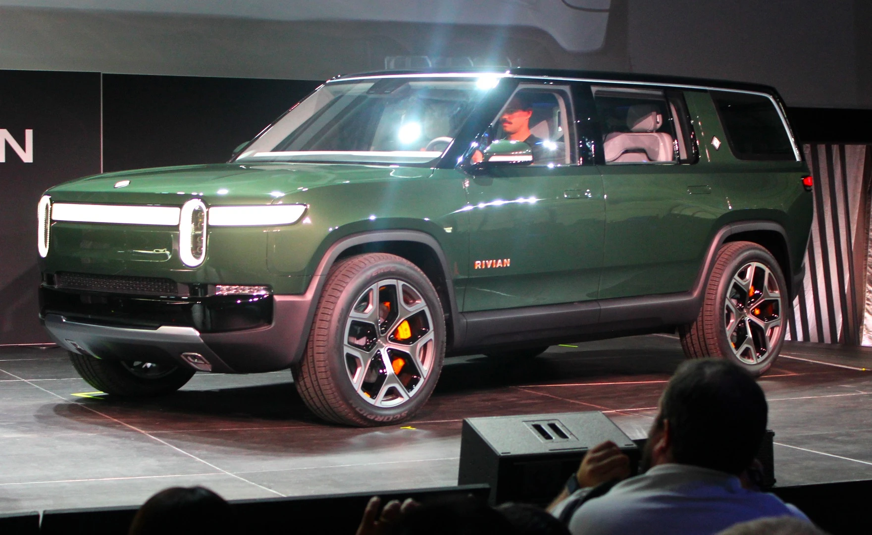 The R1S is a mixture of Land Rover and Jeep with an odd splash of Volkswagen ID conceptuals in its design