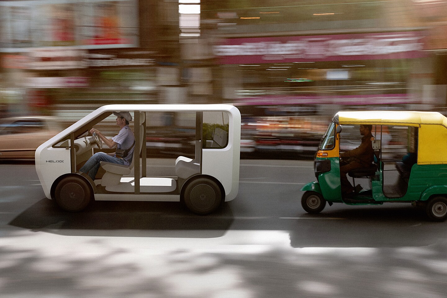 The perfect contrast between the electric Helixx and the vehicle it will replace across the world, the ubiquitous two-stroke Tuk-Tuk.