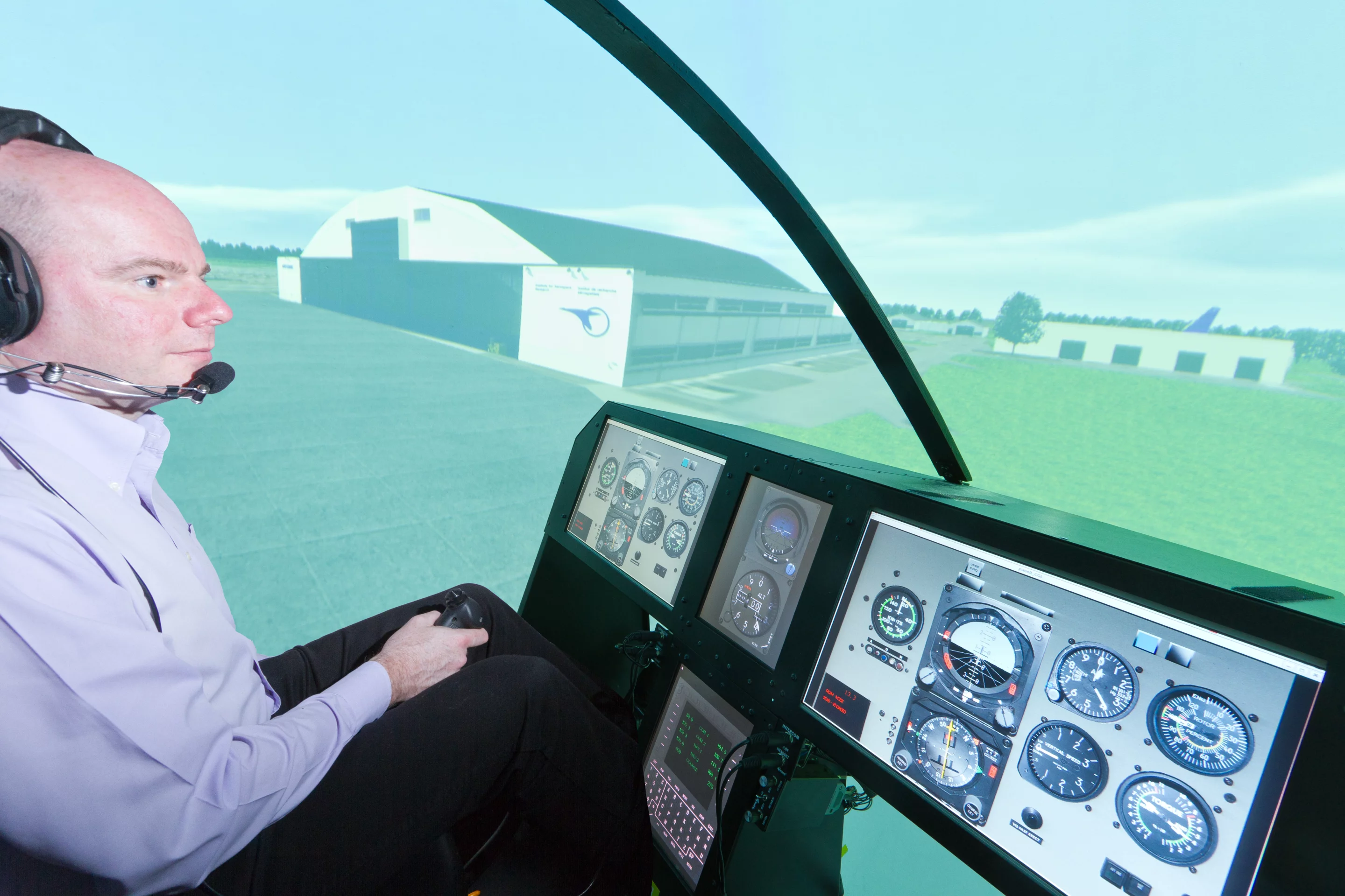 A pilot flying the HELIFLIGHT-R simulator (Image by The Univesity of Liverpool)